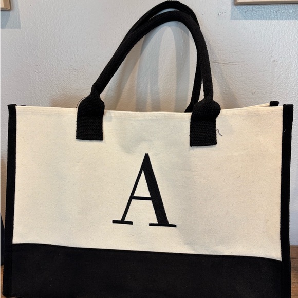 Handbags - Elegant Black and White Tote Bag with Monogram